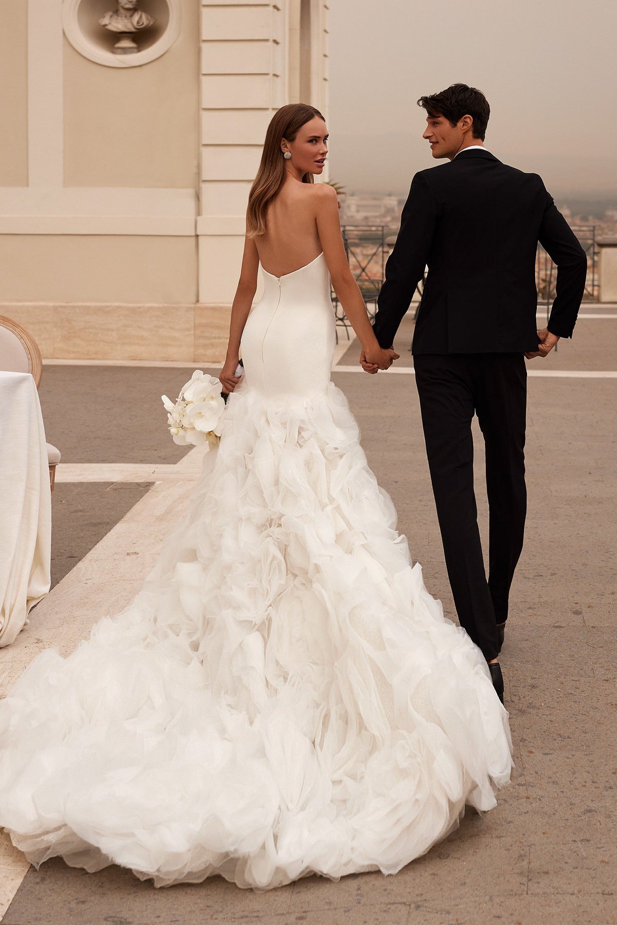 Sherri Hill 81119 strapless mermaid wedding dress with ruffled skirt in ivory