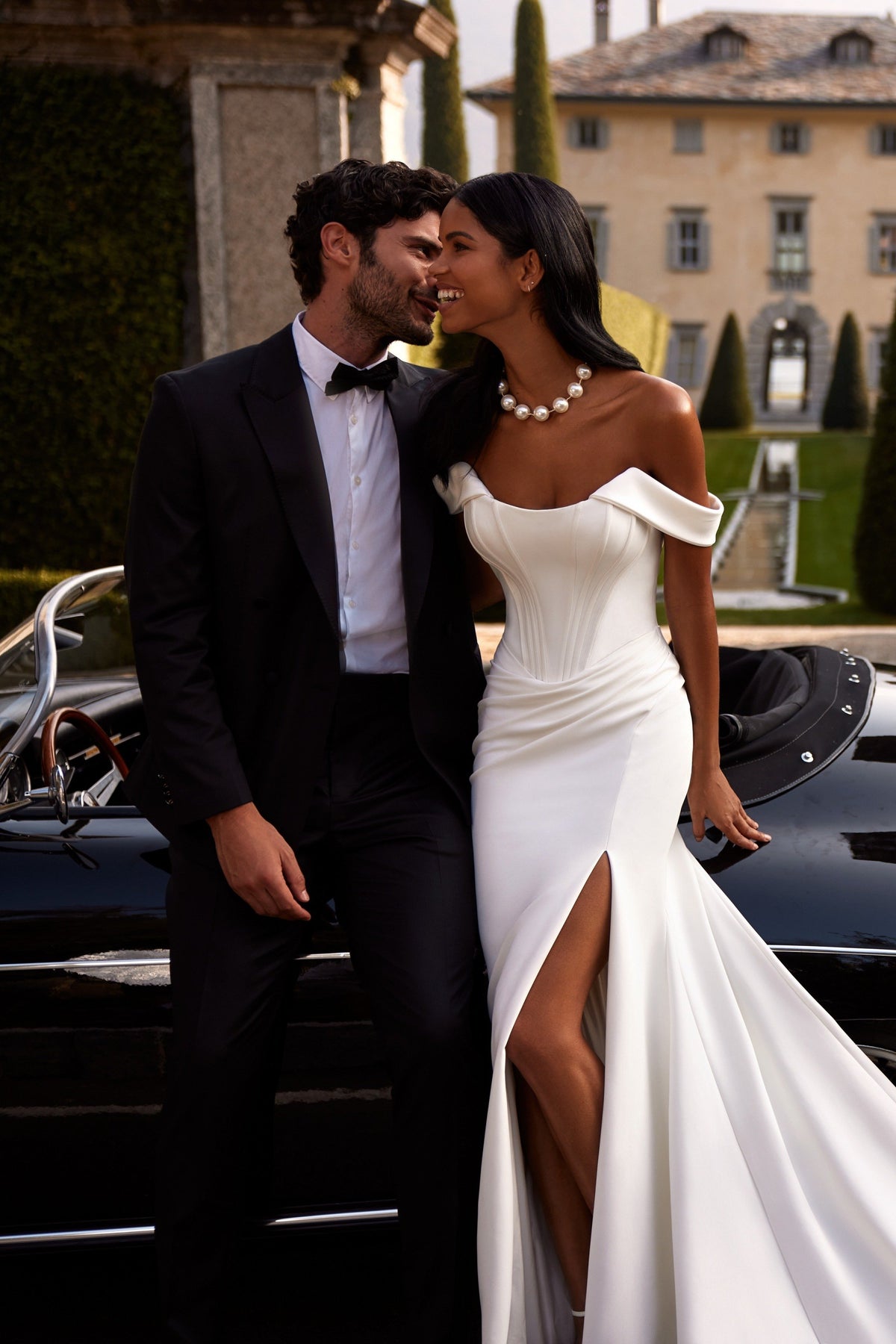 Sherri Hill 81129 strapless satin wedding dress with slit and train in ivory