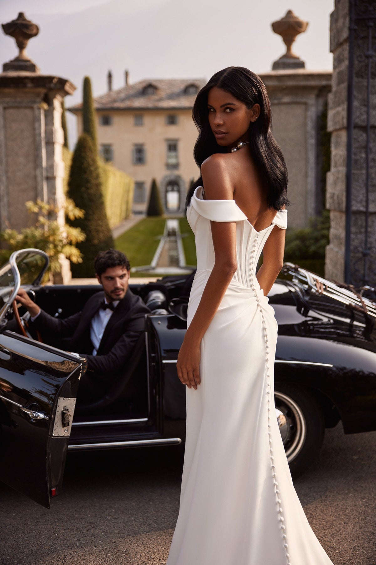 Sherri Hill 81129 strapless satin wedding dress with slit and train in ivory