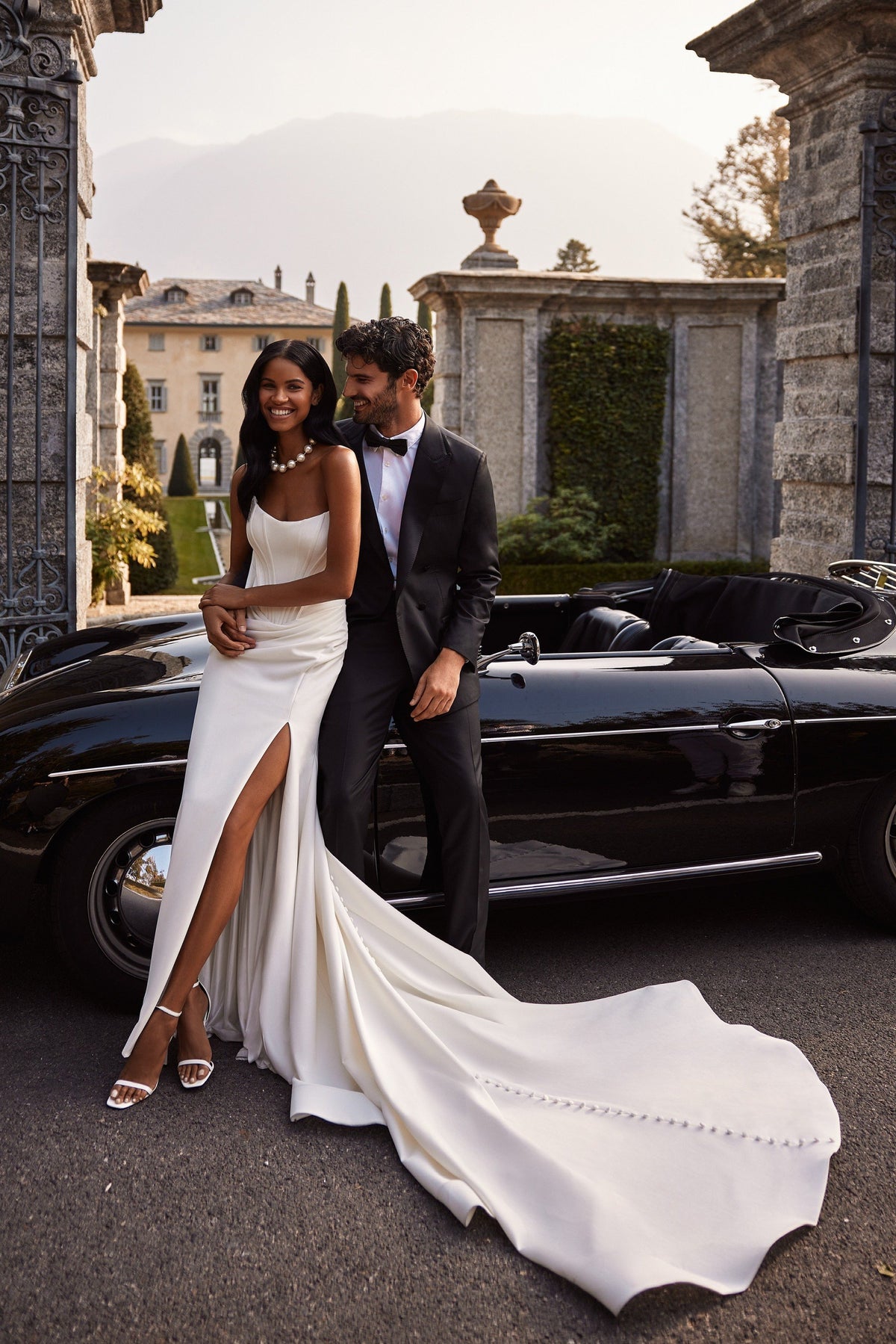 Sherri Hill 81129 strapless satin wedding dress with slit and train in ivory