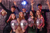 Young people with balloons on prom night