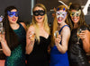 Laughing friends wearing masks holding champagne glasses, Masquerade Outfit Ideas