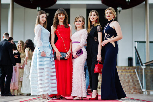 young women in awesome fashionable dresses posing, Types of Graduation Dresses
