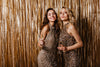 Joyful ladies look at camera on gold background, What to Wear to Homecoming