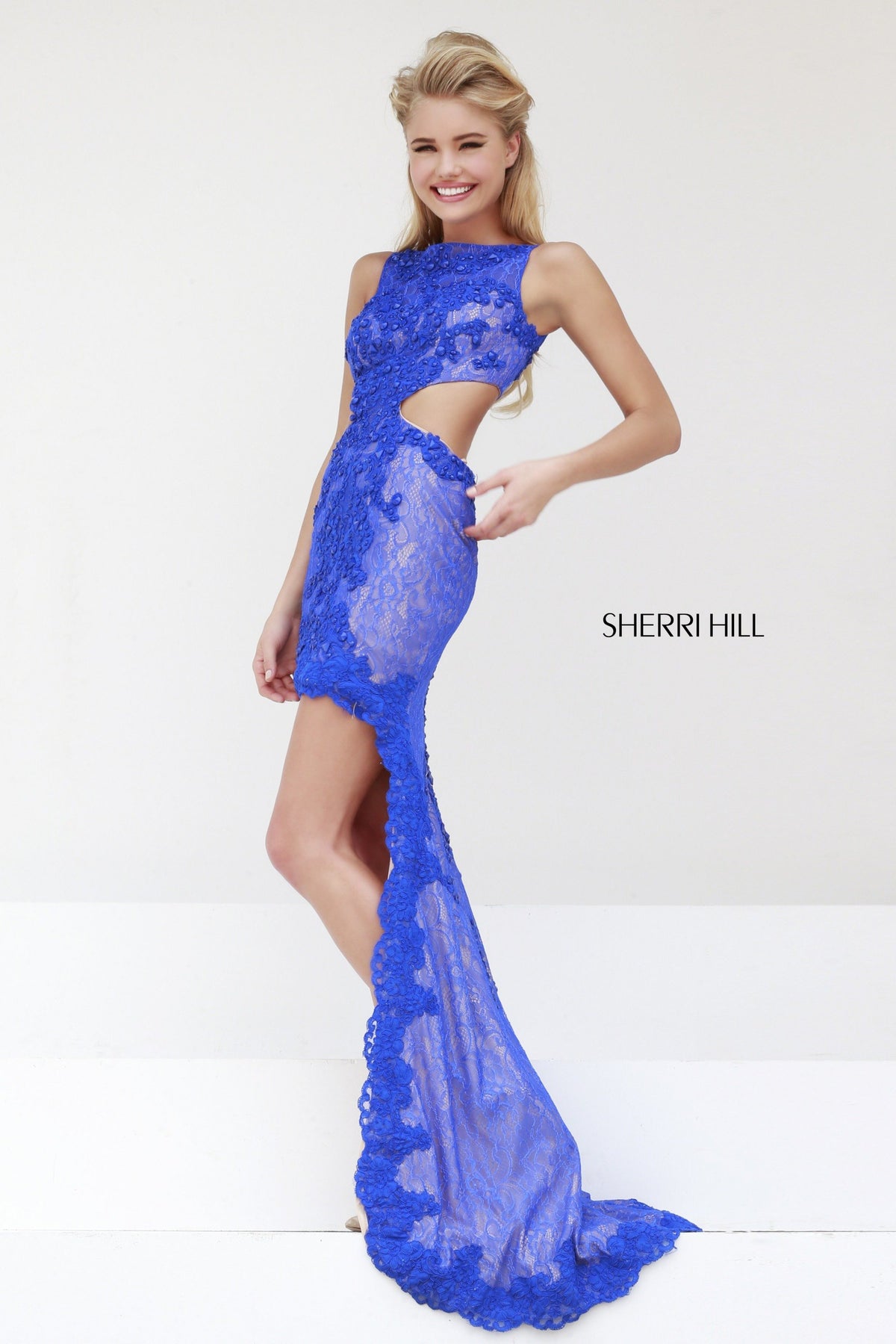 Sherri Hill 4324 lace fitted gown with cutouts and slit in royal