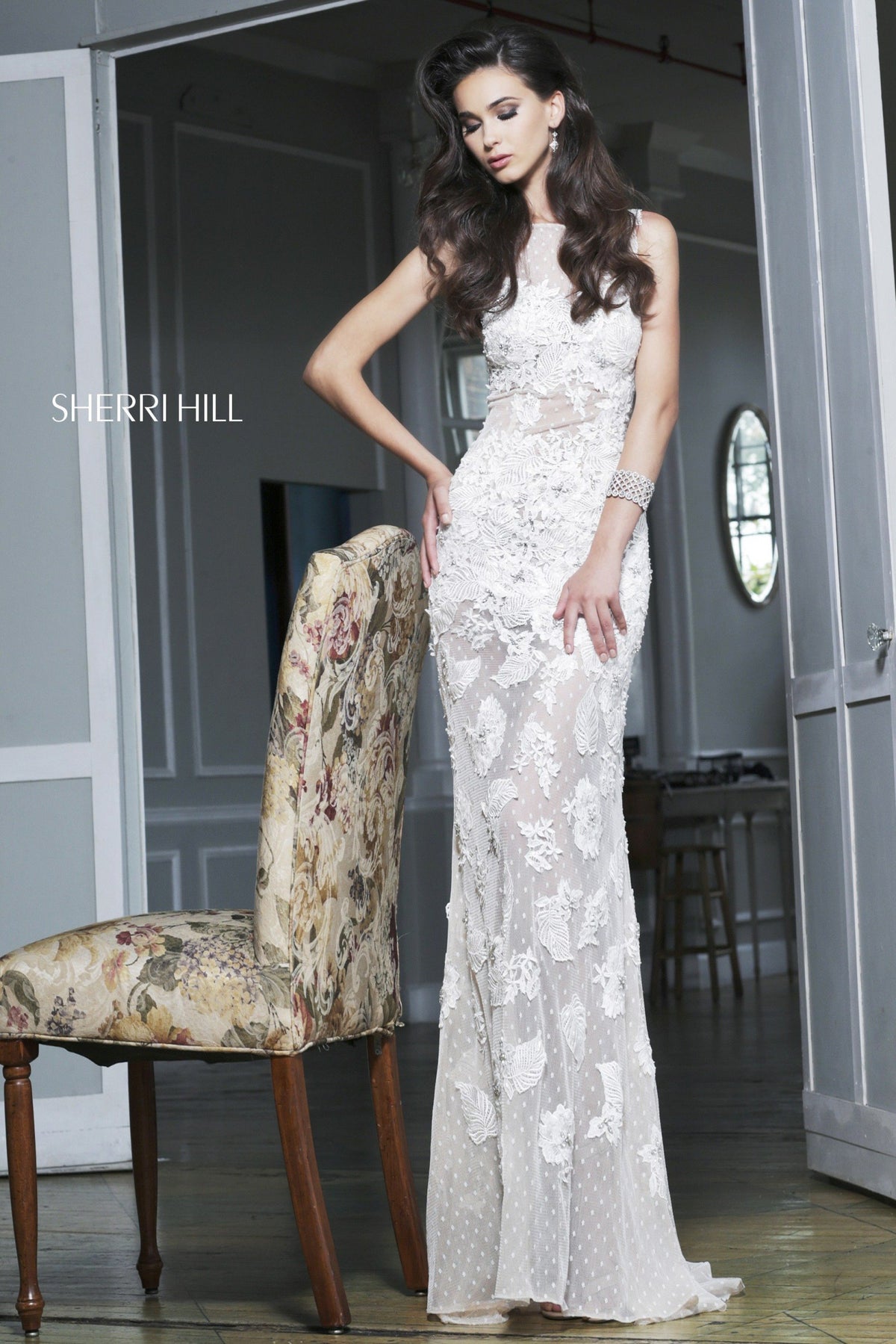Sherri Hill 11127 lace fitted gown with sheer neckline in ivory/nude