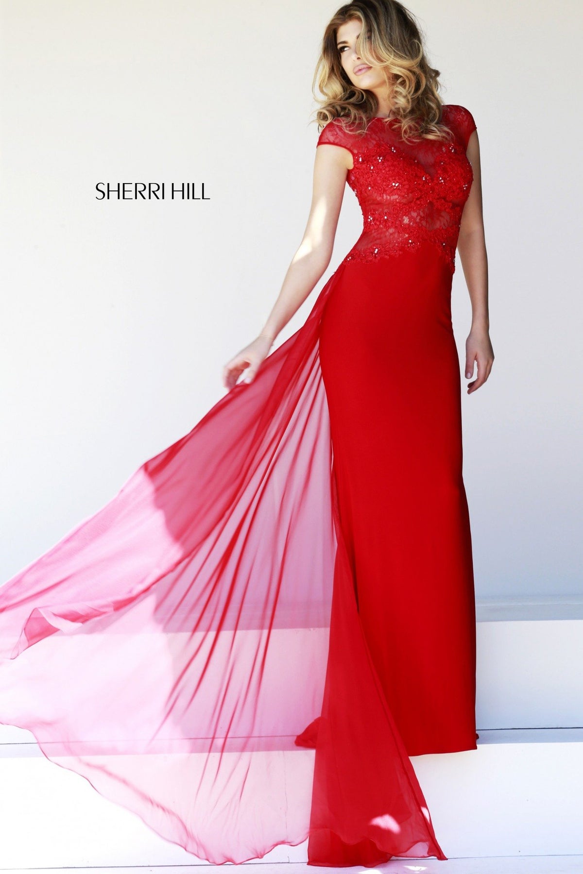 Sherri Hill 21365 cap-sleeve lace fitted gown with sheer overskirt in red