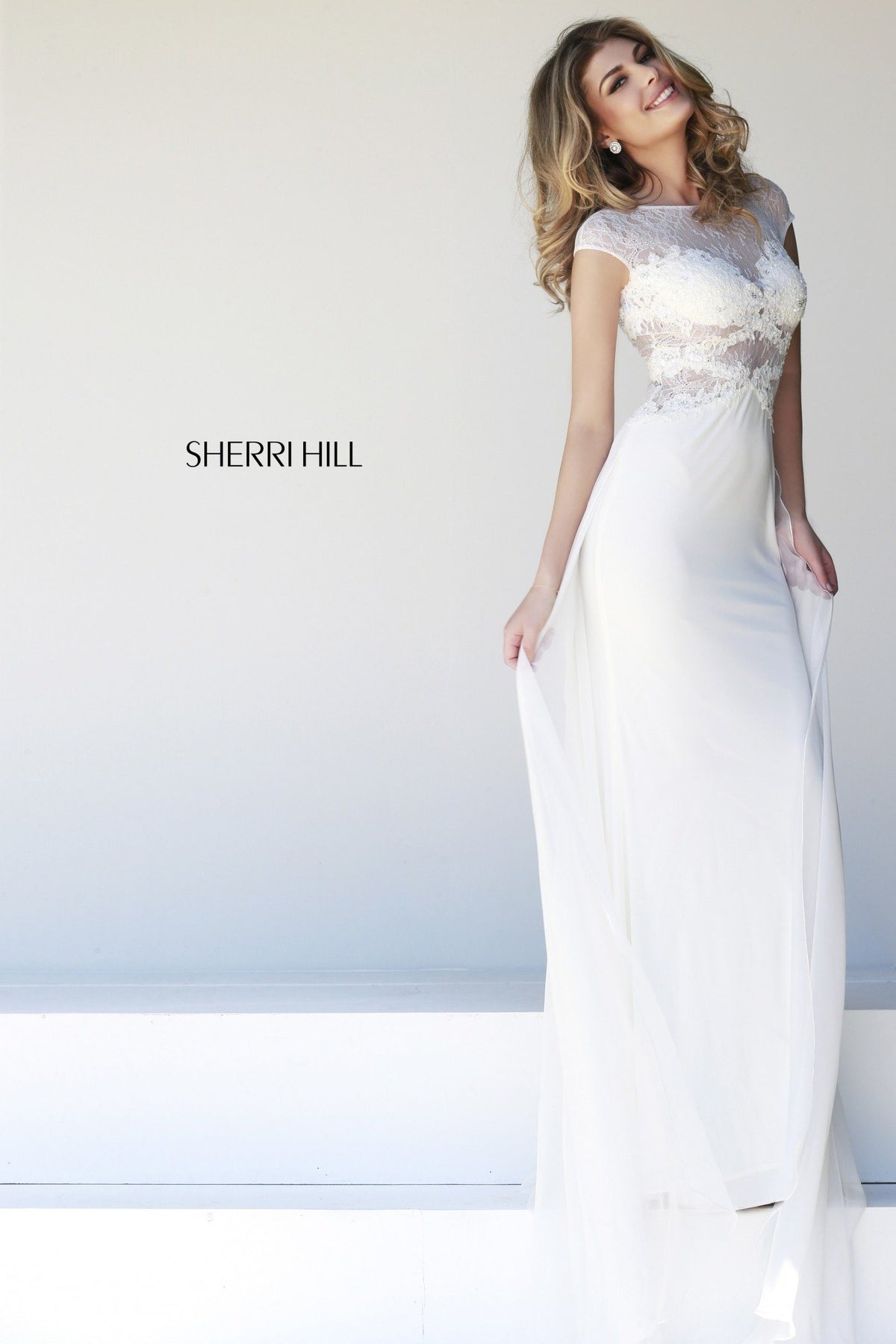 Sherri Hill 21365 cap-sleeve lace fitted gown with sheer overskirt in ivory