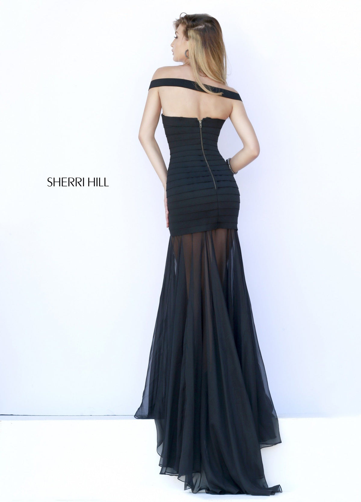 Sherri Hill 32169 off-the-shoulder fitted gown with sheer skirt in black