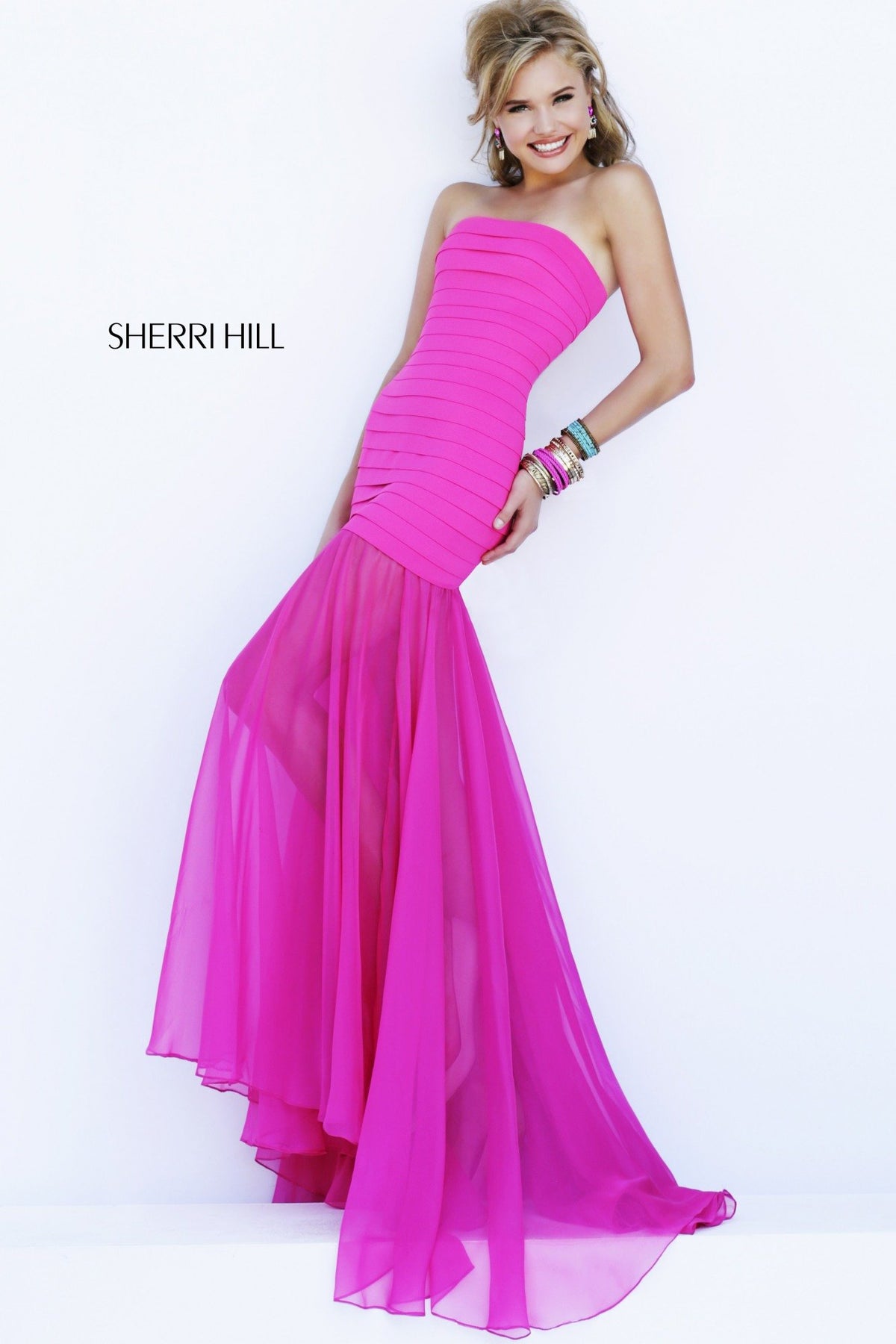 Sherri Hill 32167 strapless mermaid gown with chiffon skirt in fuchsia