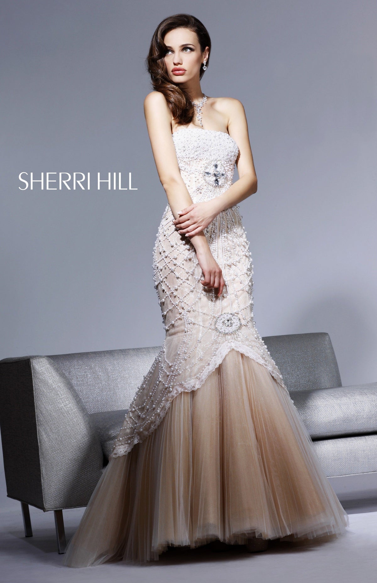 Sherri Hill 2789 one-shoulder beaded mermaid gown with tulle skirt in ivory/nude