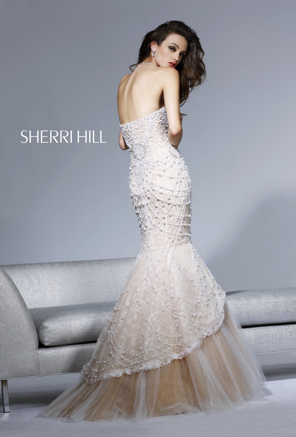 Sherri Hill 2789 one-shoulder beaded mermaid gown with tulle skirt in ivory/nude