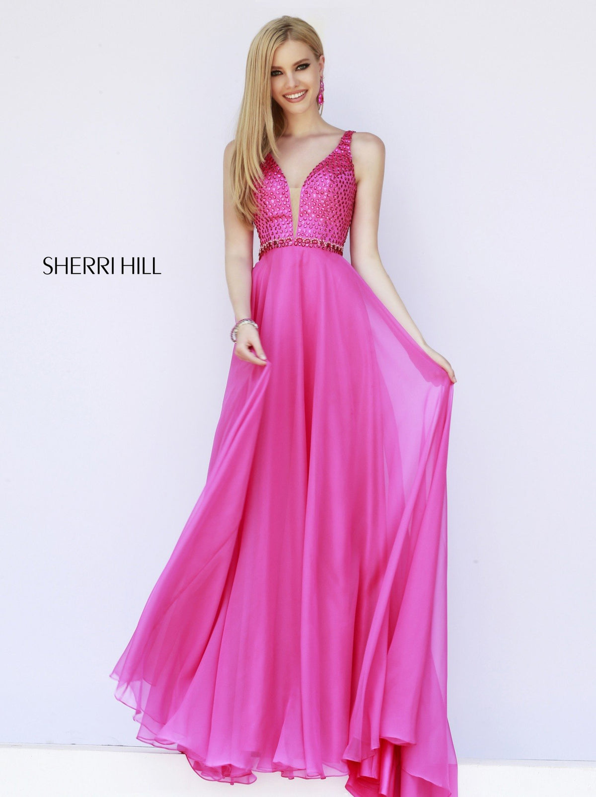 Sherri Hill 32150 V-neck chiffon gown in fuchsia