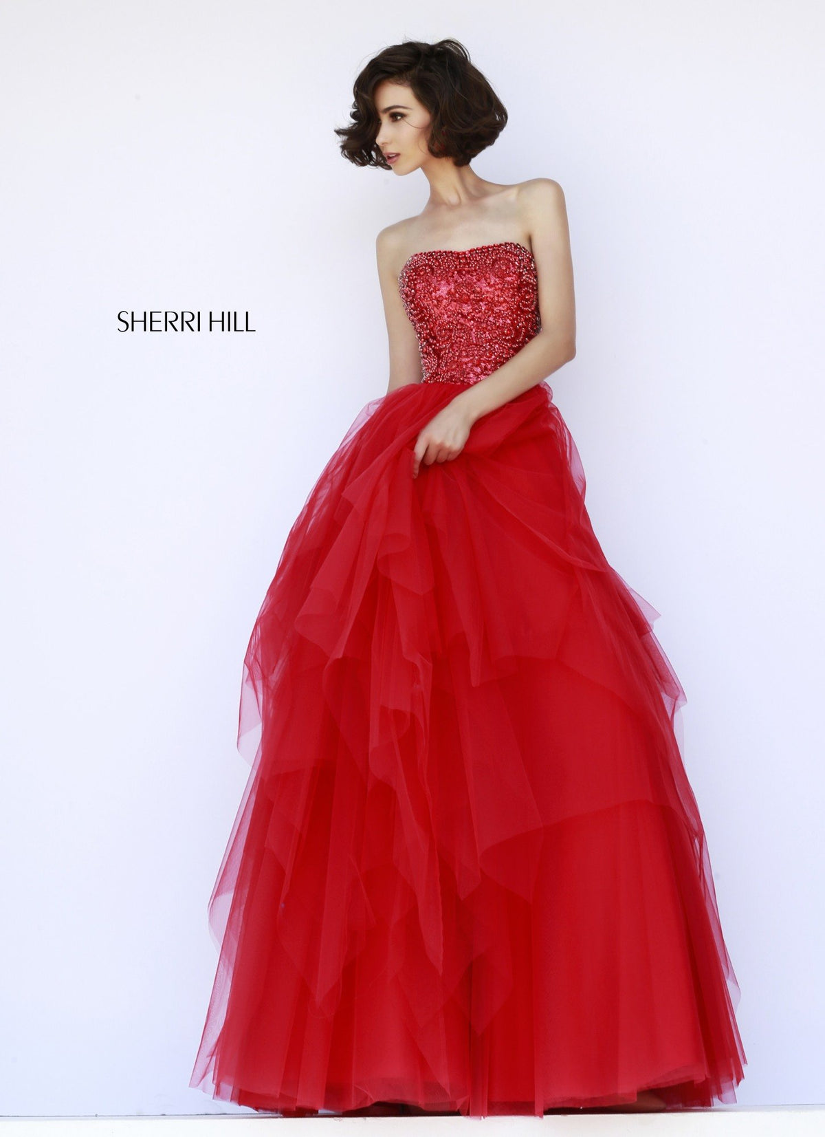 Sherri Hill 11210 strapless beaded ball gown with tiered tulle skirt in red