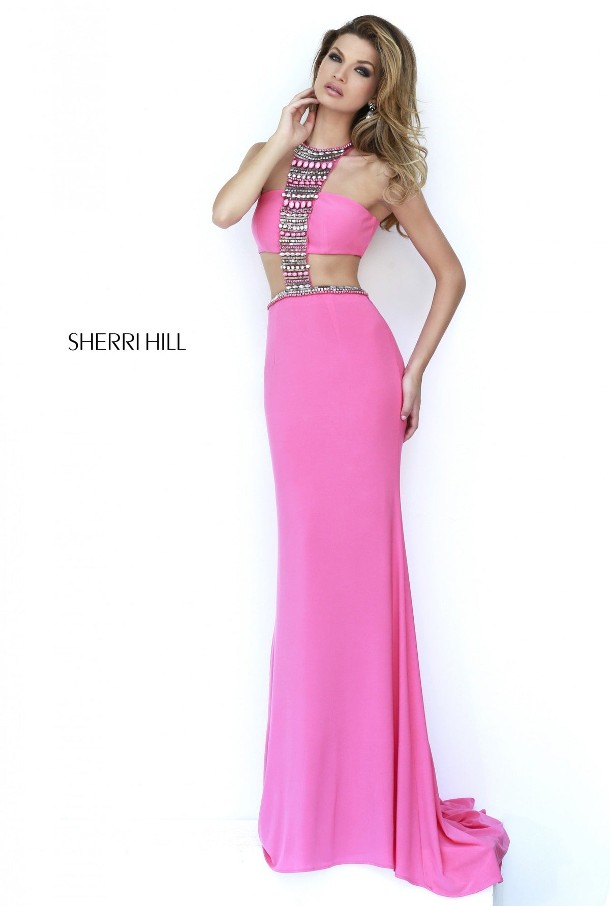 Sherri Hill 32166 fitted jersey gown with beaded cutouts in coral
