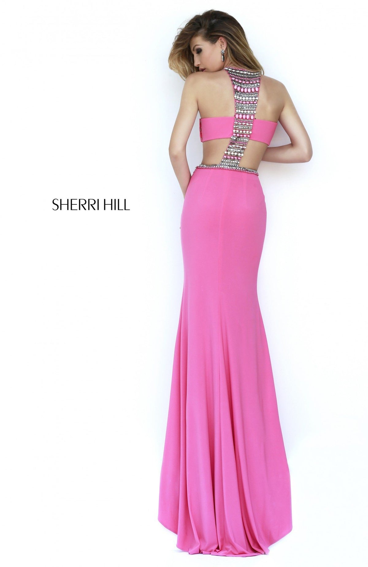 Sherri Hill 32166 fitted jersey gown with beaded cutouts in coral