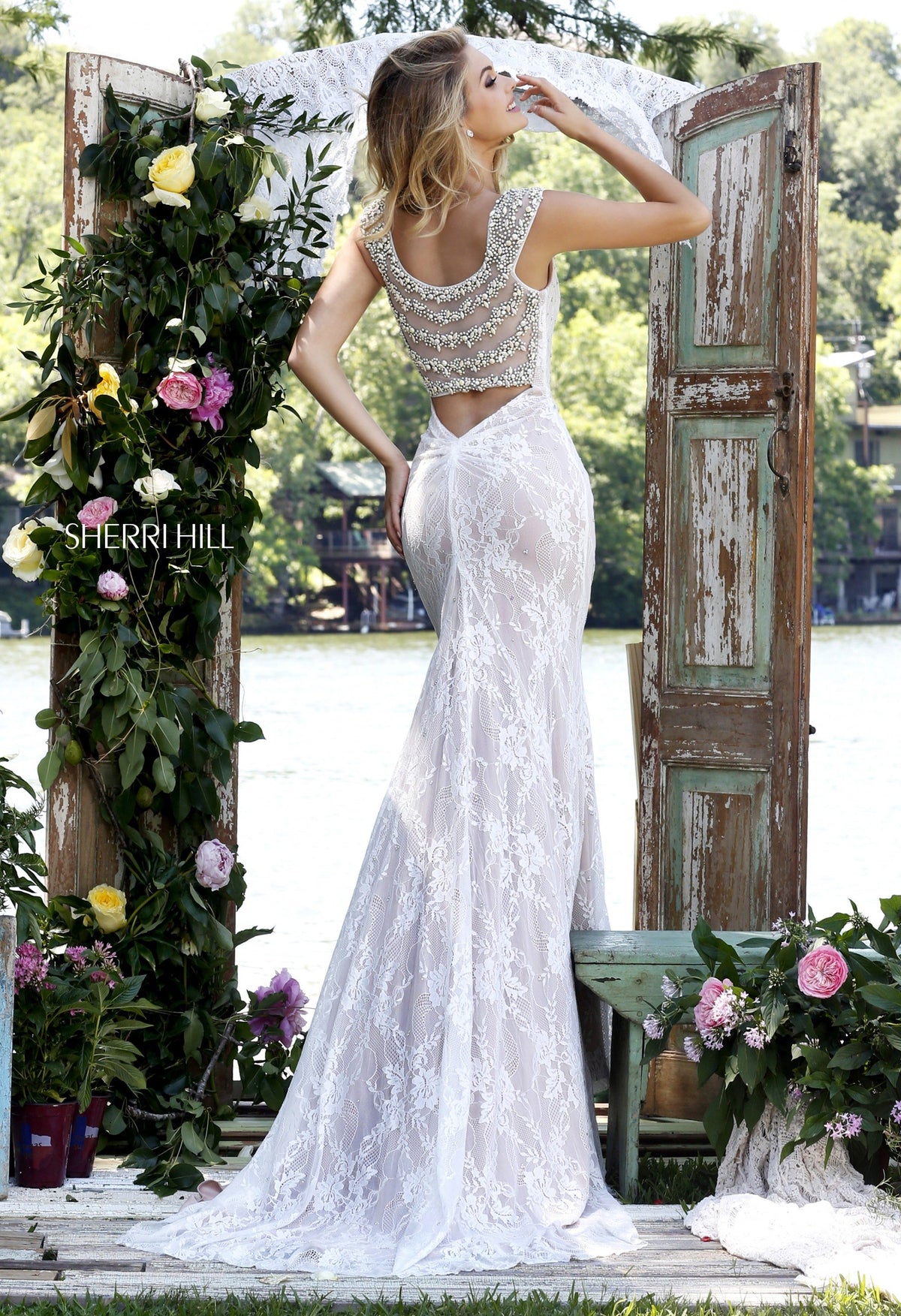 Sherri Hill 50048 lace mermaid gown in ivory/nude