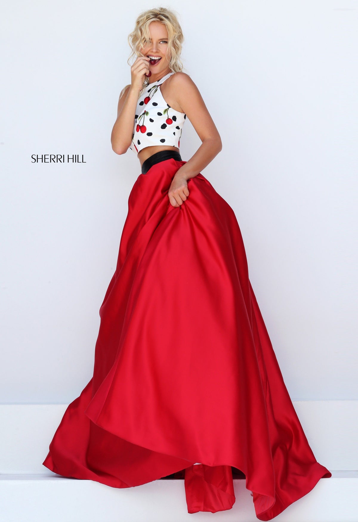 Sherri Hill 50217 two-piece satin ball gown with embroidered crop top in ivory/red print