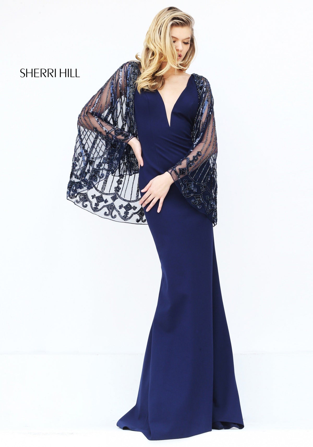 Sherri Hill 50655 V-neck gown with sheer cape sleeves in navy