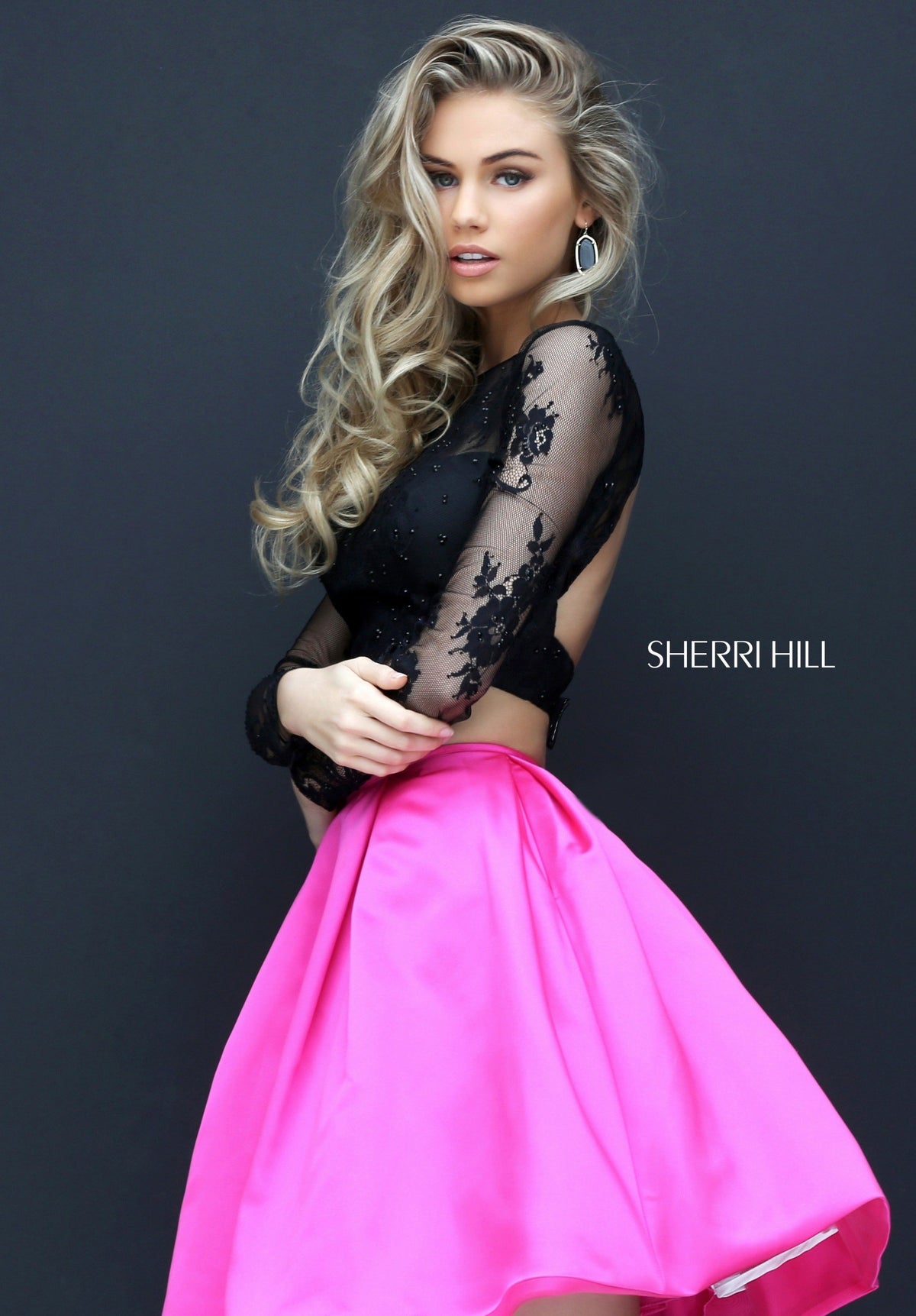 Sherri Hill 50533 two-piece cocktail dress with long-sleeve lace crop top in black/fuchsia