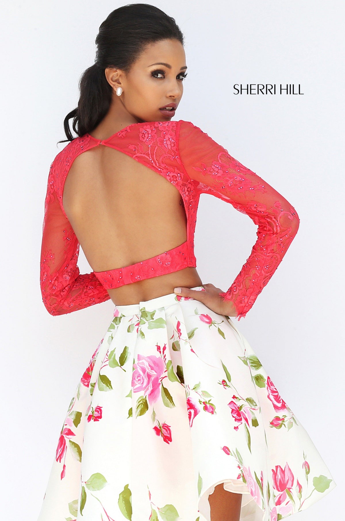 Sherri Hill 50563 two-piece cocktail dress with long-sleeve lace top and floral skirt in coral/ivory print