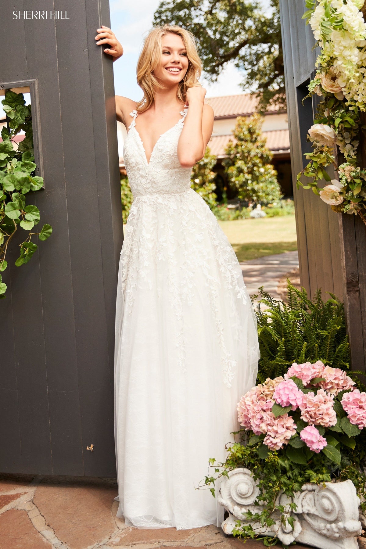 Sherri Hill 52342 leaf lace appliqued A-line gown in ivory