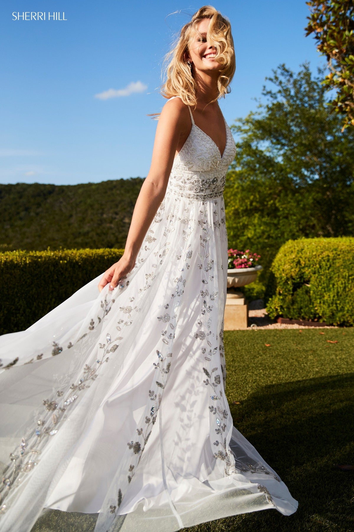 Sherri Hill 52461 chiffon sheath dress with deep-V-neckline in ivory