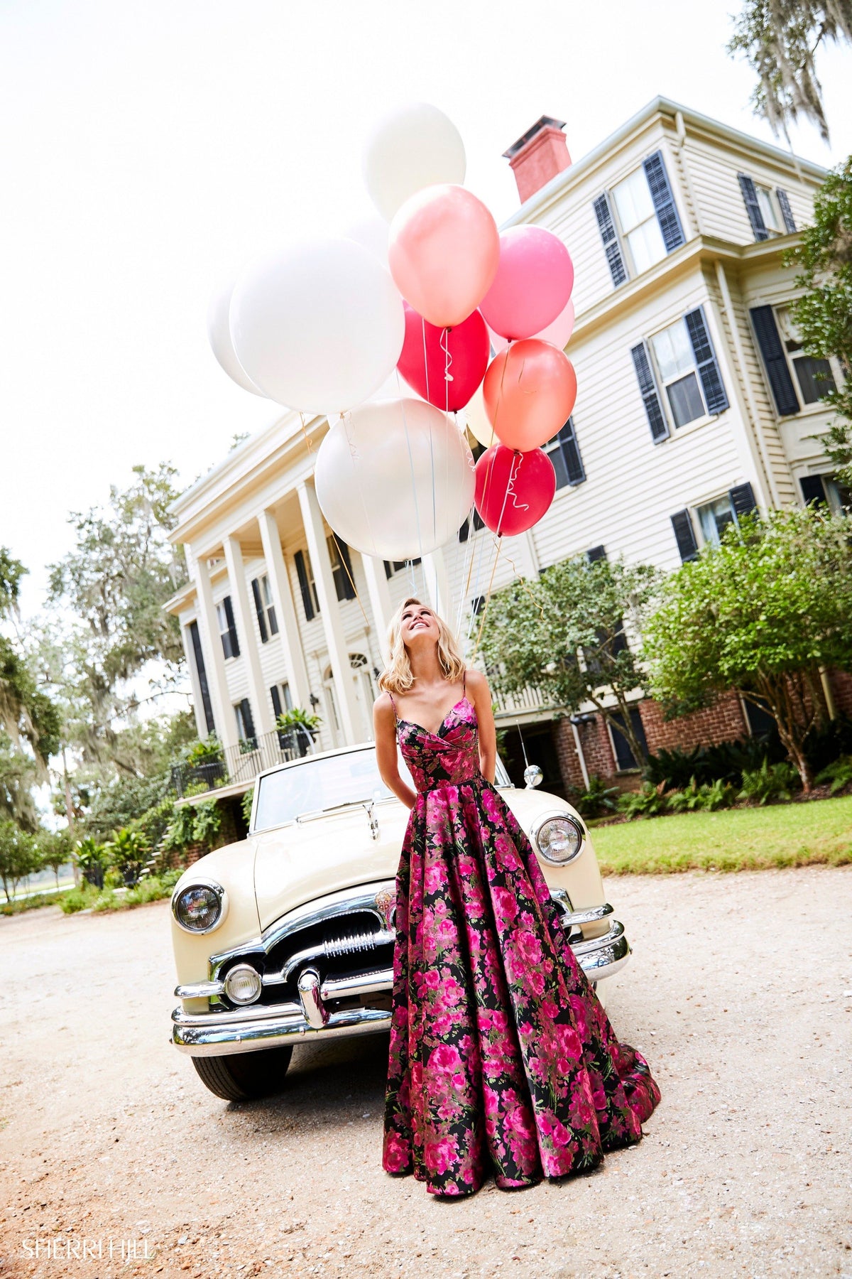Sherri Hill 52932 floral print satin A-line gown in black/fuchsia print