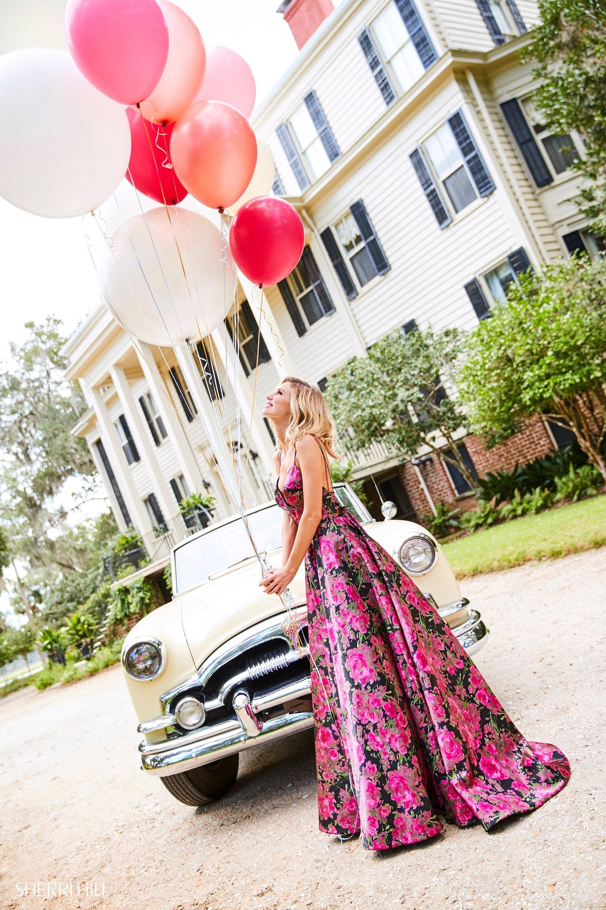 Sherri Hill 52932 floral print satin A-line gown in black/fuchsia print