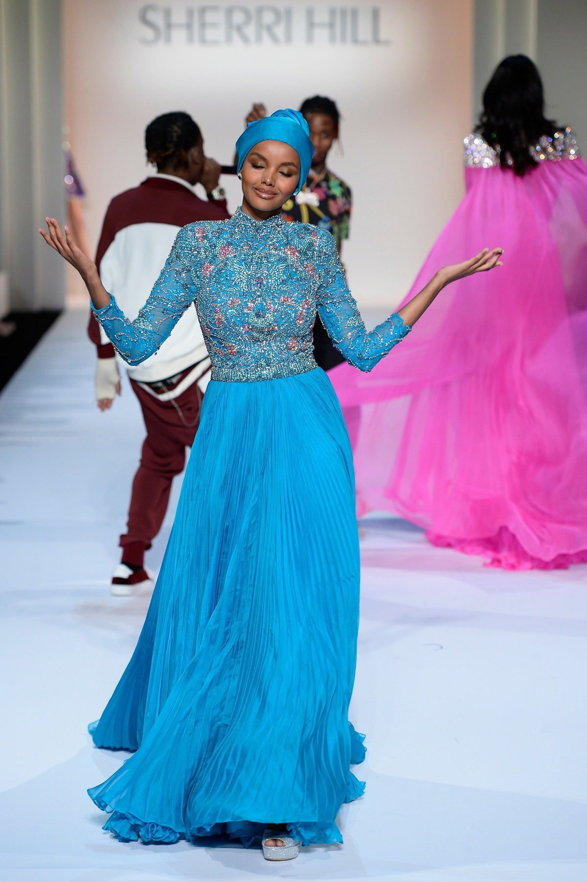 Sherri Hill 44792 beaded long-sleeve gown in turquoise