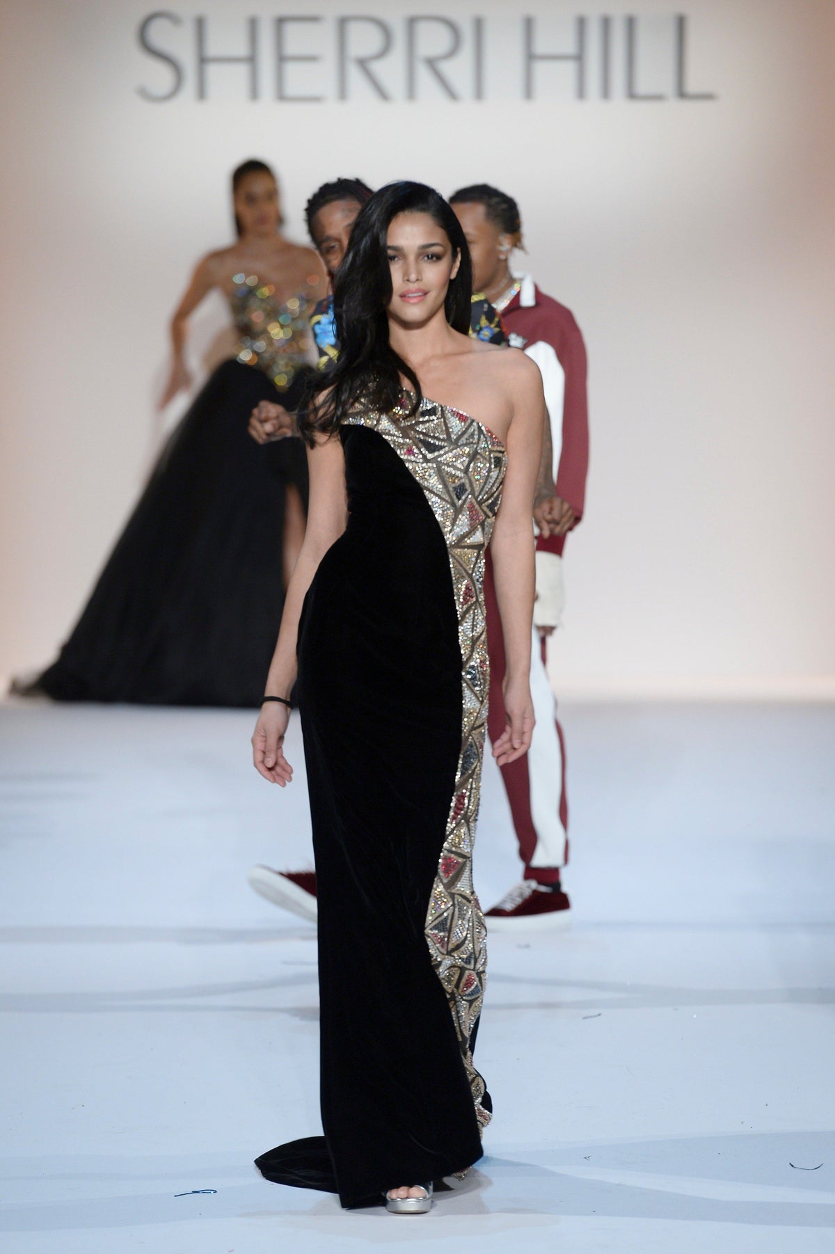 Sherri Hill 44765 one-shoulder velvet fitted gown with slit in black