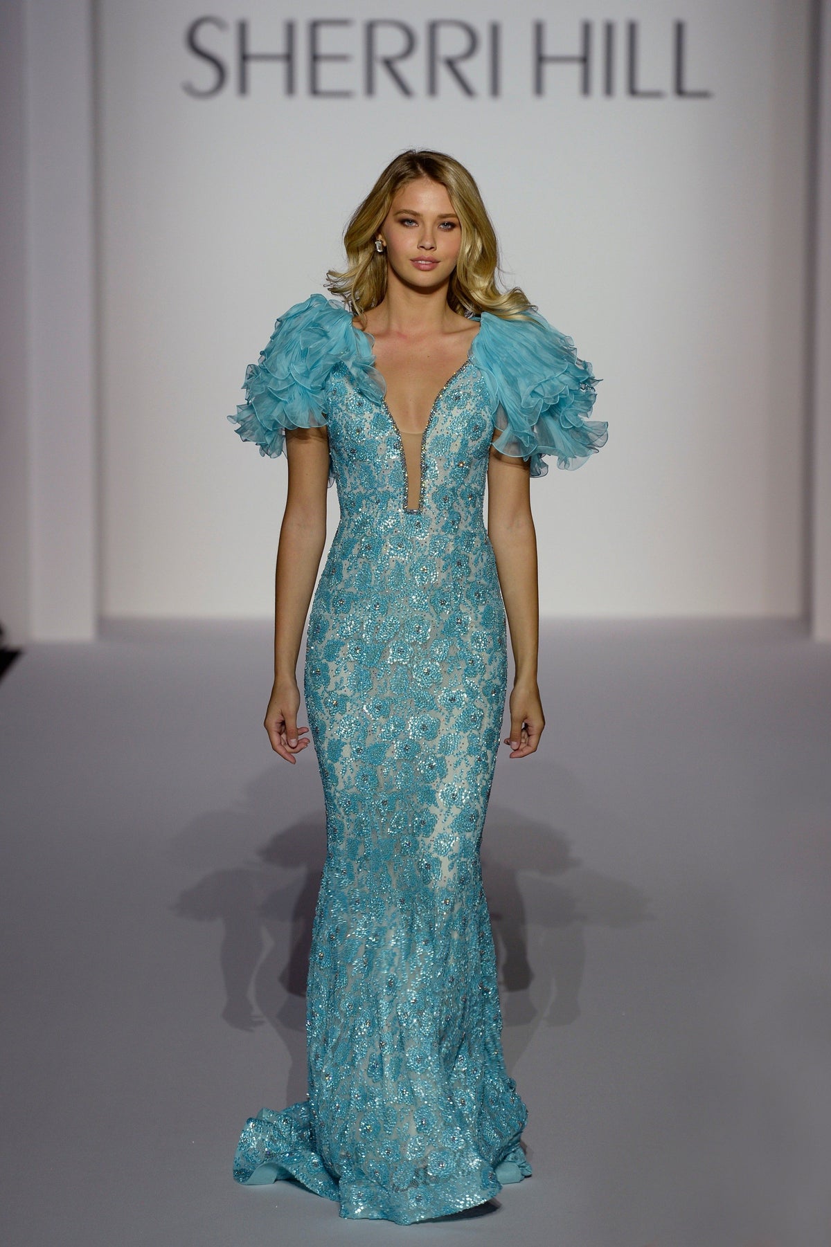 Sherri Hill 44667 beaded mermaid gown with puff sleeves in aqua