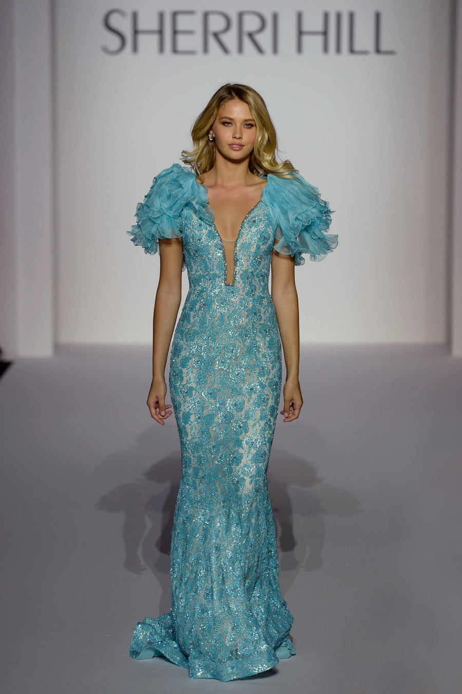 Sherri Hill style 44667 in aqua, Beaded Mermaid Gown with Puff Sleeves