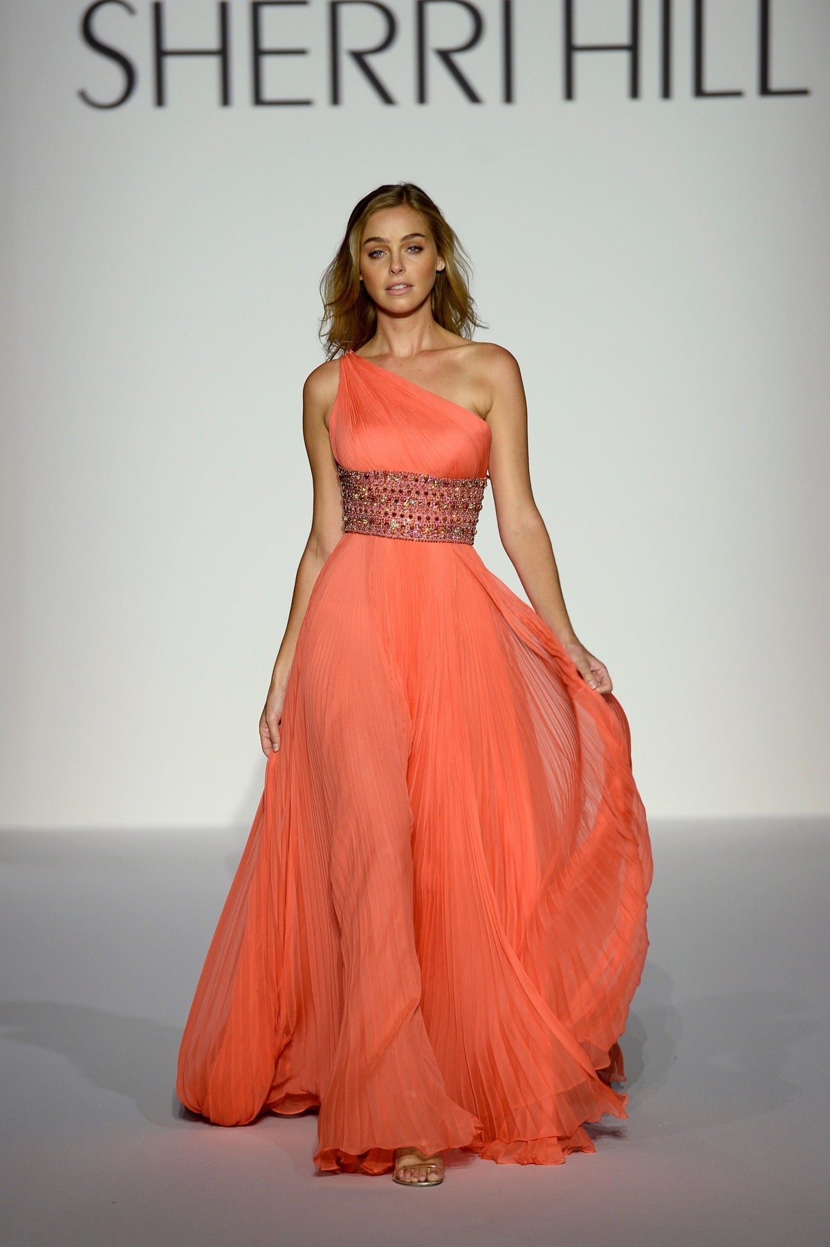 Sherri Hill 44664 one-shoulder chiffon gown with beaded waist in coral