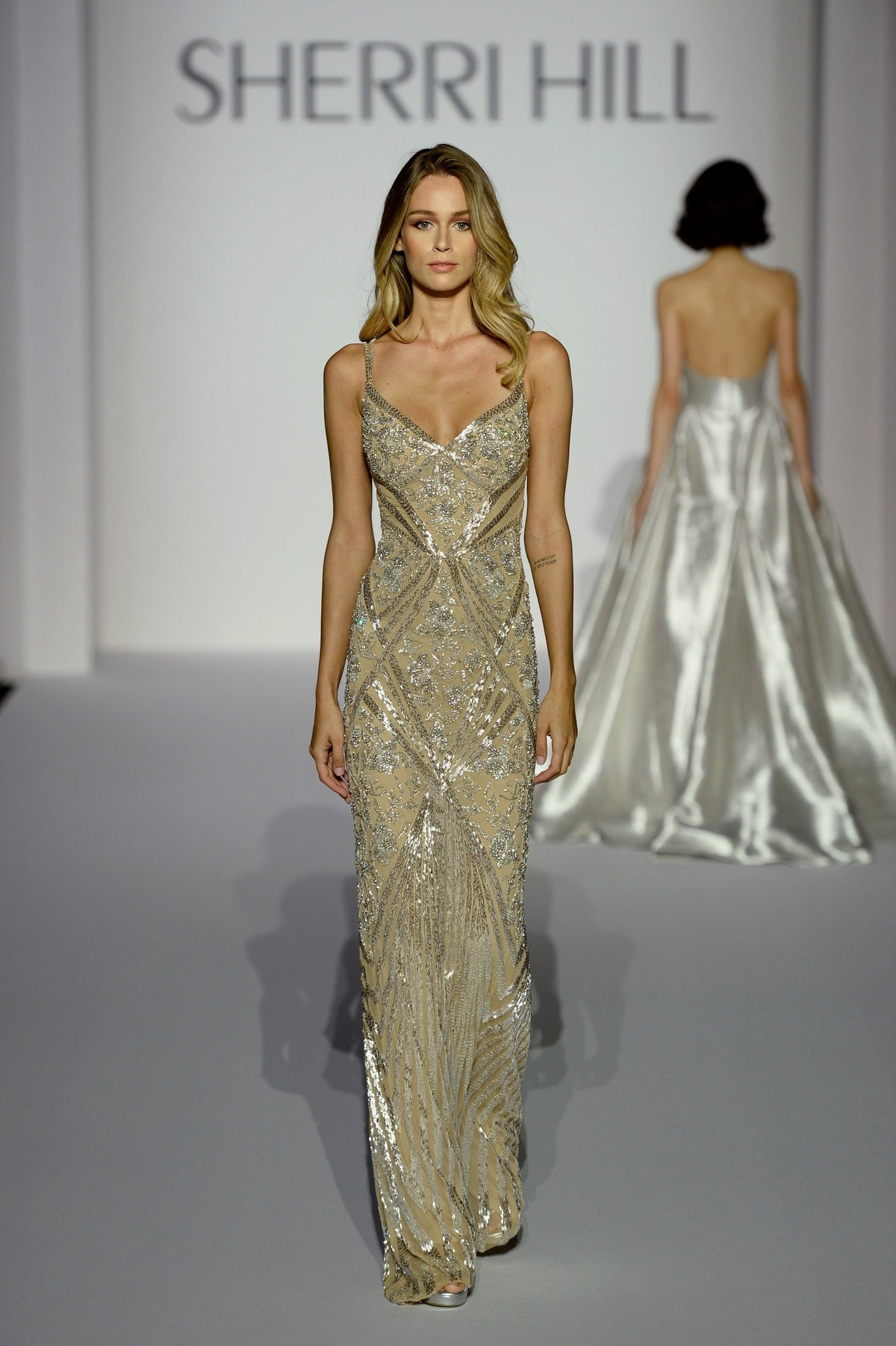 Sherri Hill 44639 beaded fitted gown with open back in gold/nude