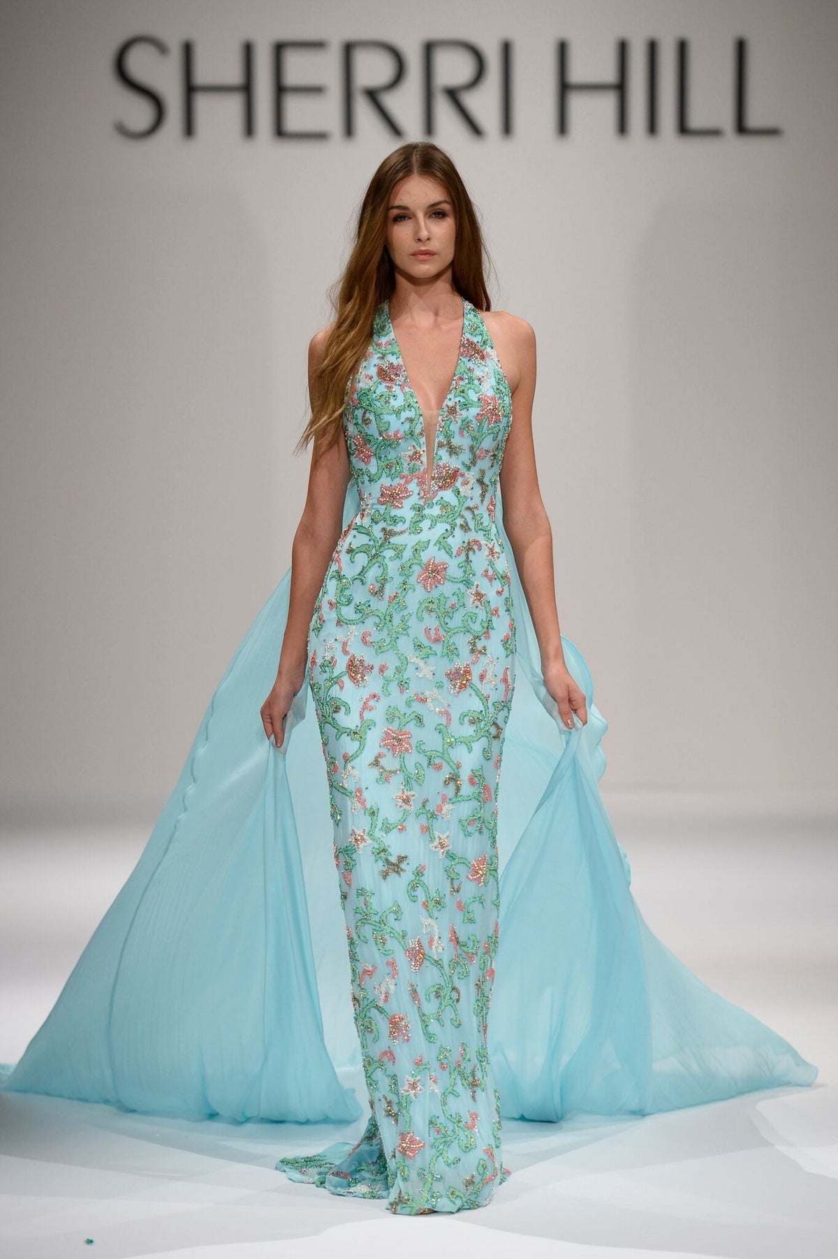 Sherri Hill 44312 V-neck beaded fitted gown with overskirt in light blue/multi
