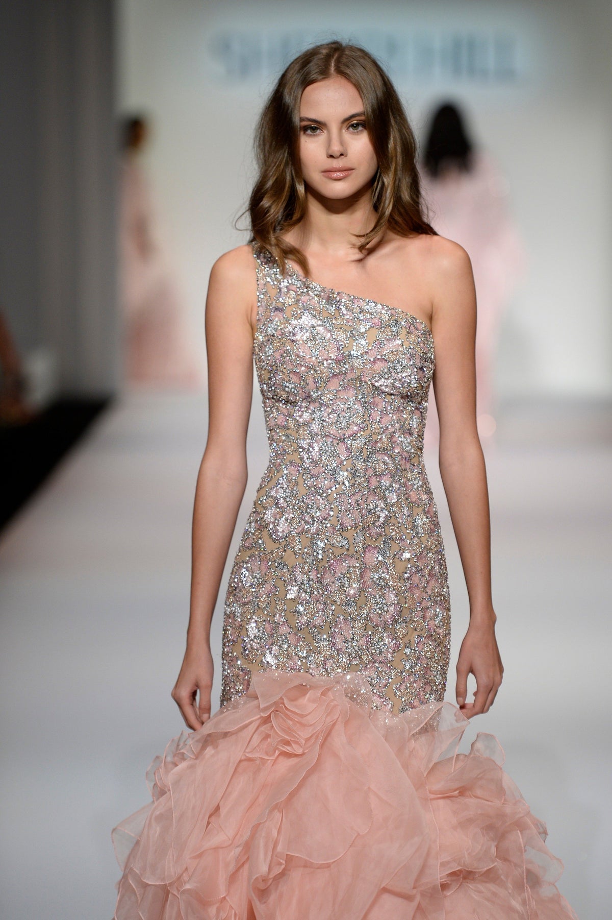 Sherri Hill 44876 beaded mermaid gown with ruffled skirt in blush