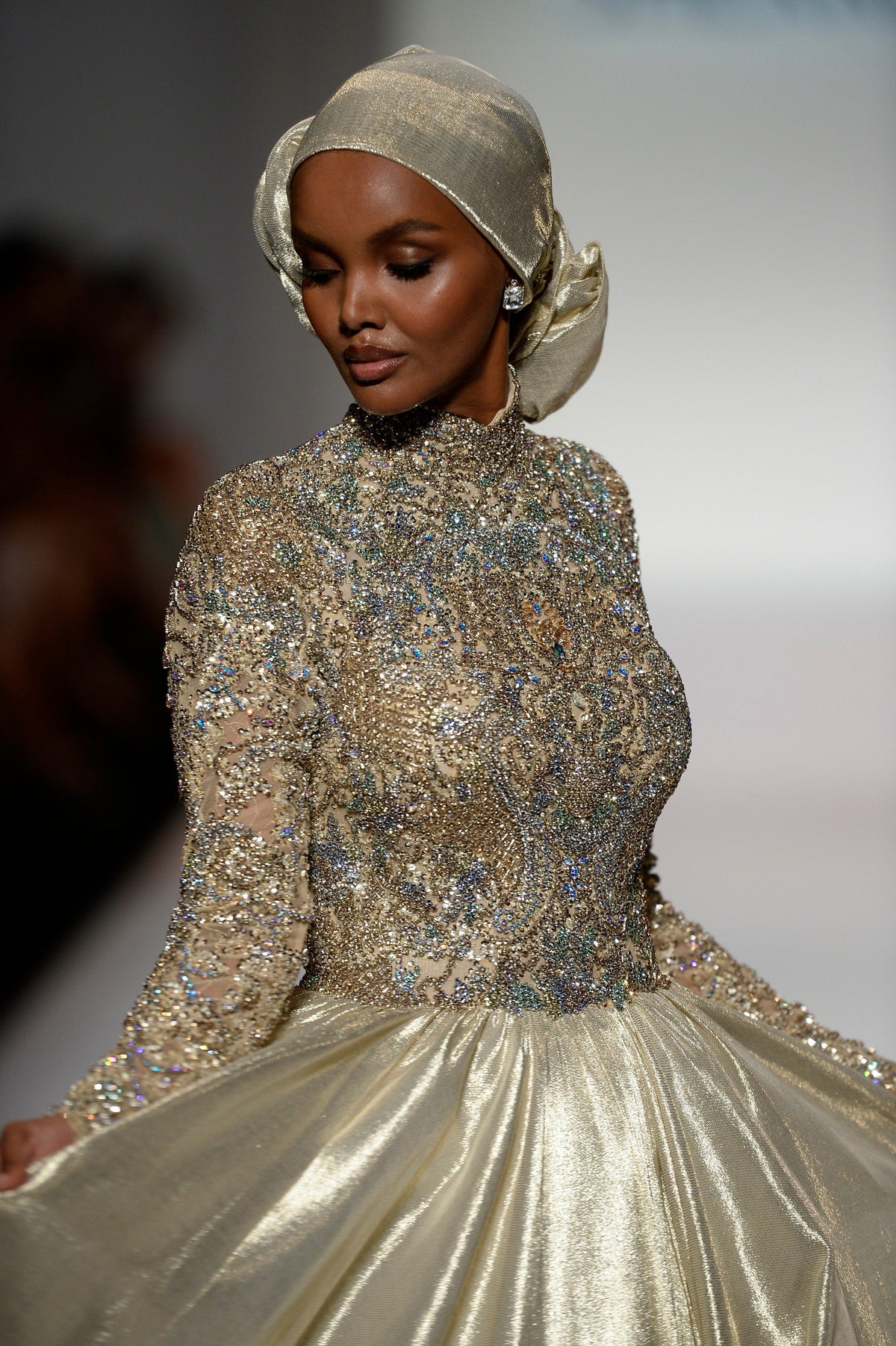 Sherri Hill 44895 long-sleeve metallic ball gown in gold