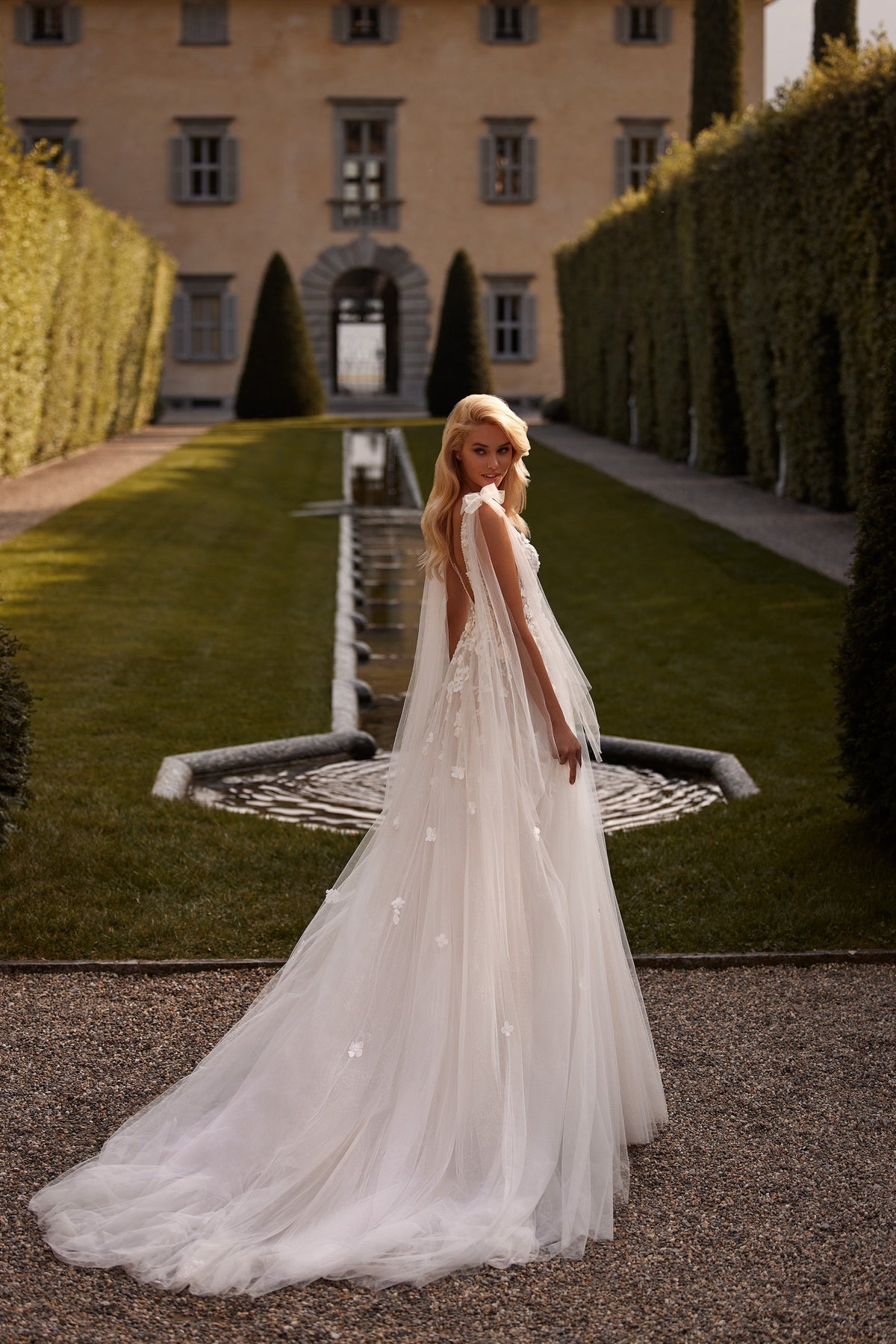 Sherri Hill 81139 V-neck floral appliquéd wedding dress with cape in ivory