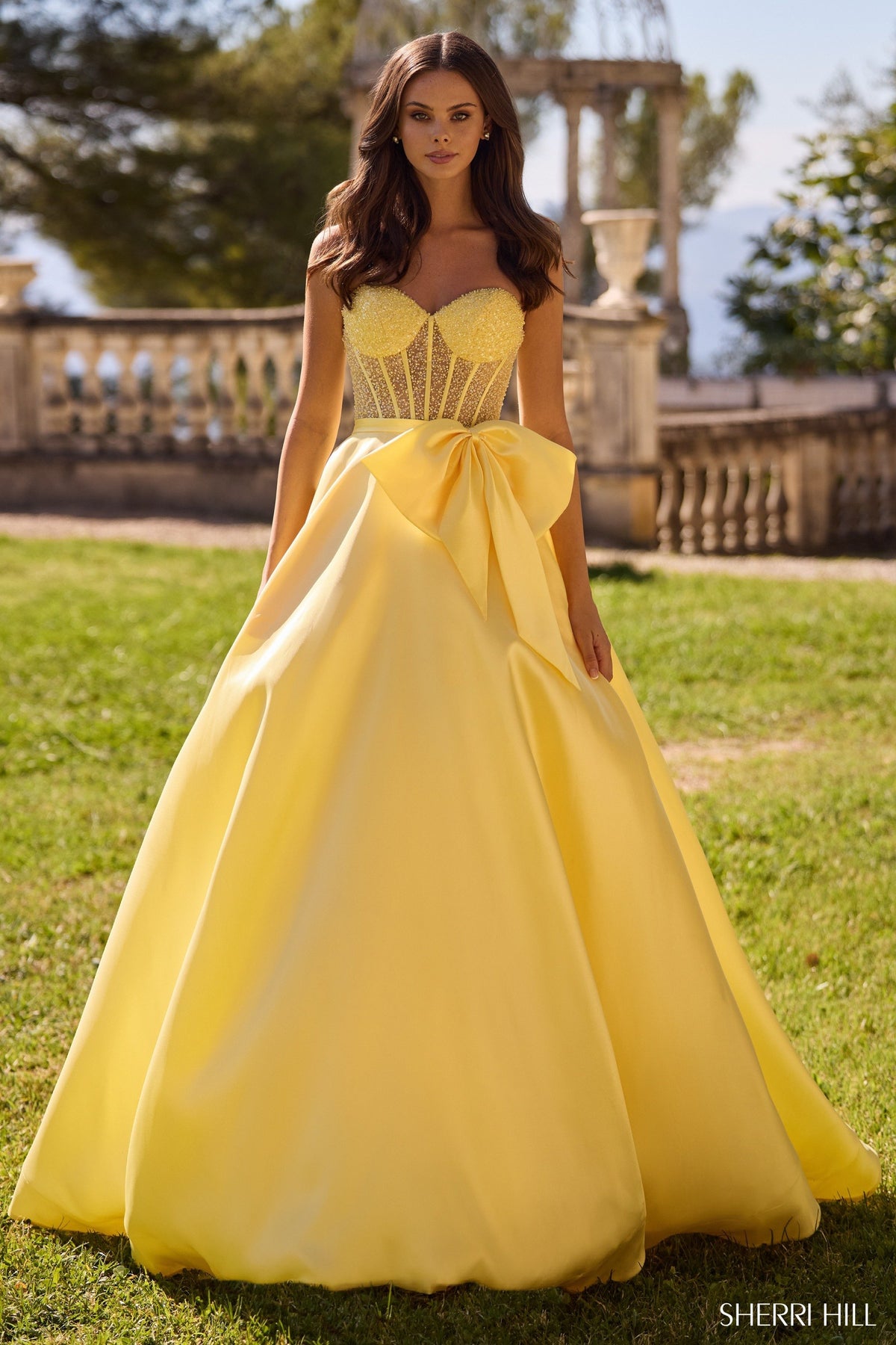 Sherri Hill 57035 strapless ball gown in light yellow