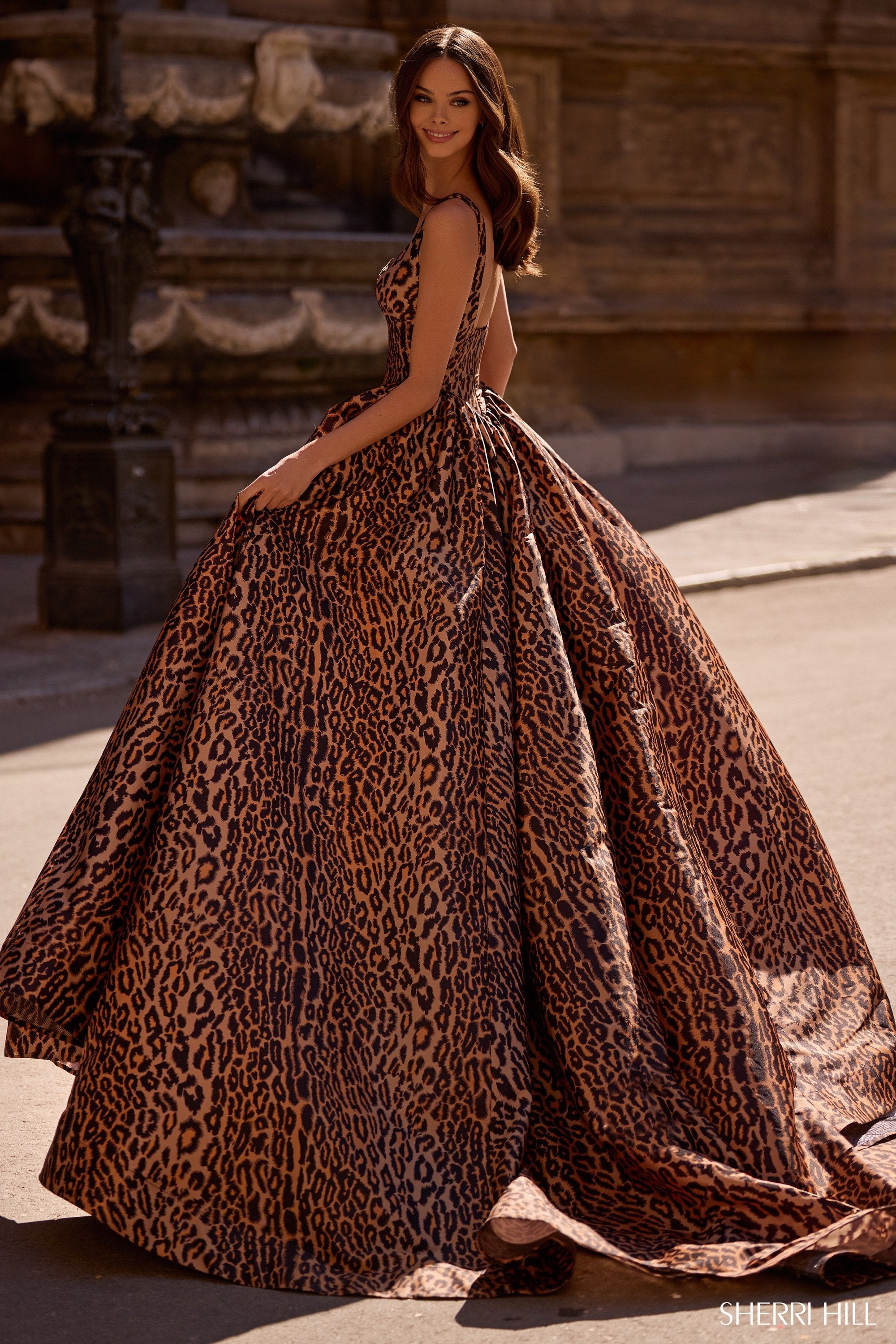 sherri hill cheetah prom dress POV: you choose bold , This @sherrihill dress was made to stand out at Prom! #sherrihill #promdress #leoparddress #leopardprint #prom2026 @caylan_collins