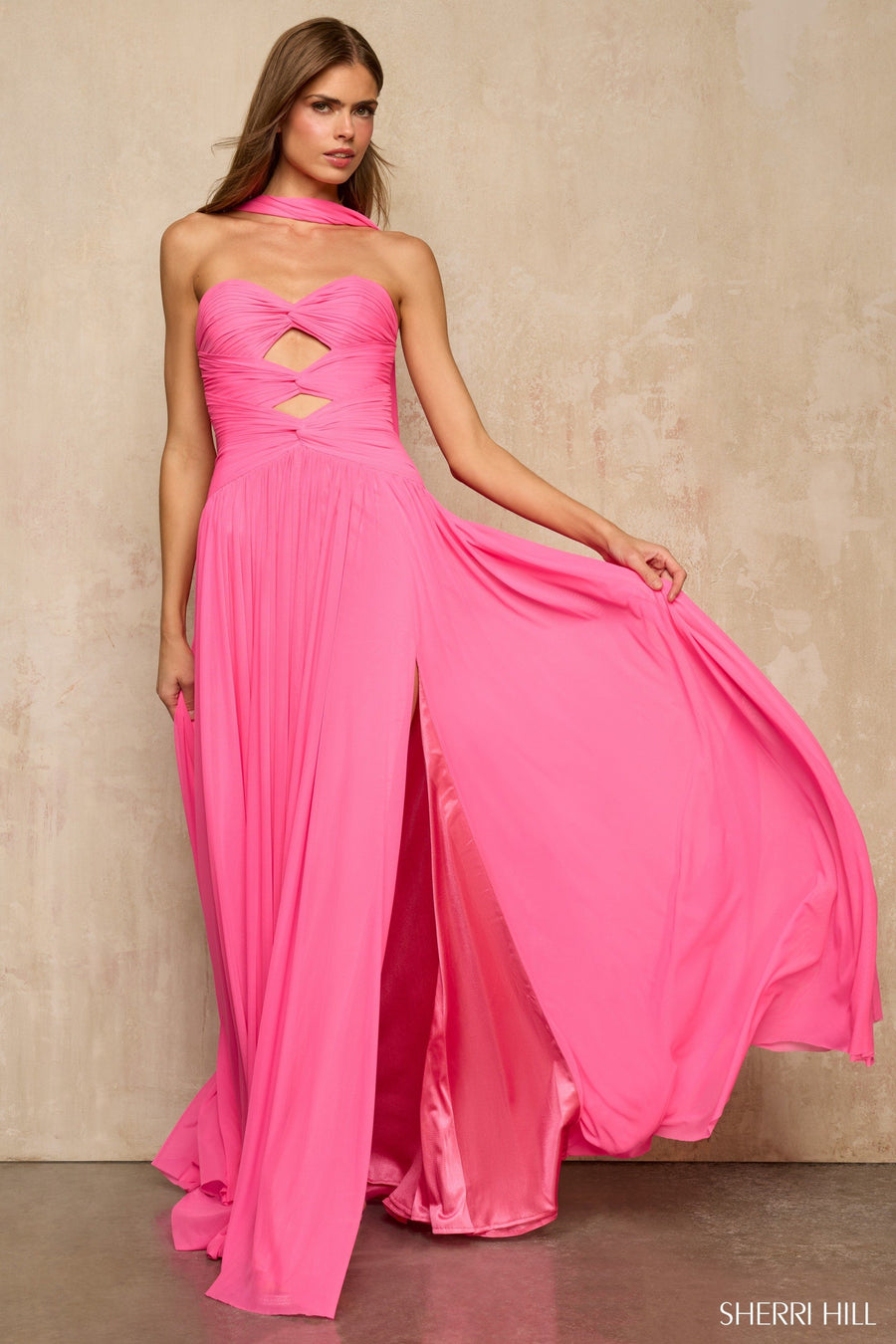 Sherri Hill style 57951 in bright pink, Chiffon Gown with Cutout Bodice