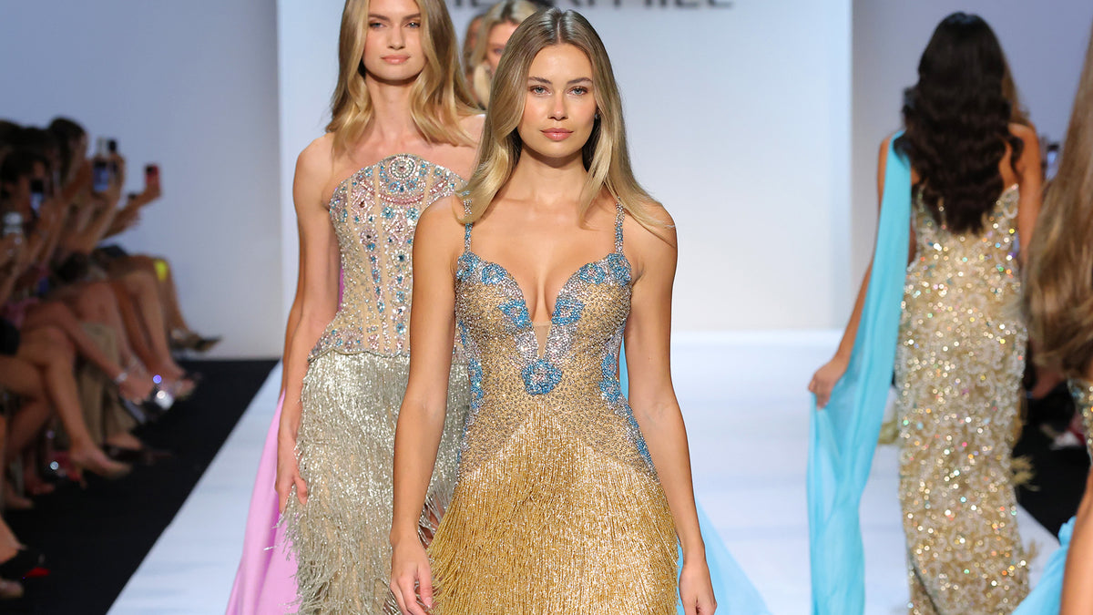 Models in beaded and fringed Sherri Hill gowns on the Spring 2027 runway at New York Fashion Week