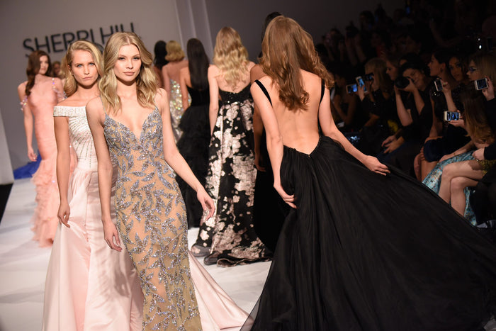 Josie Canseco and Sailor Brinkley-Cook on the runway, seen from the front row