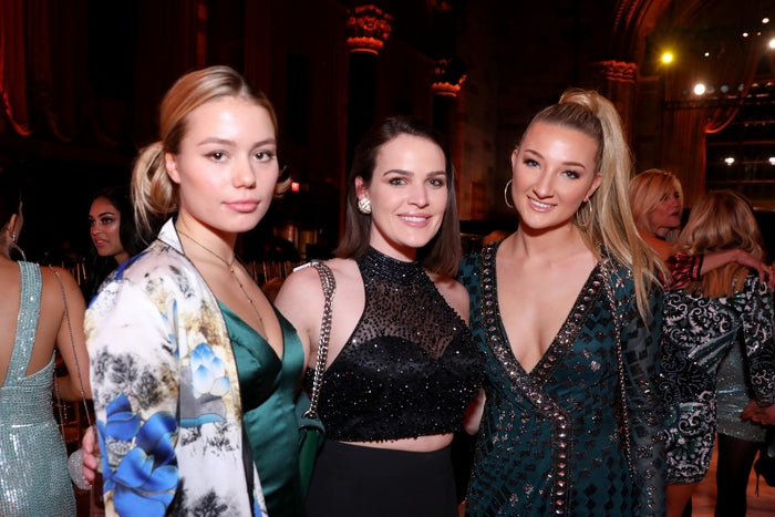 Three guests at the after party
