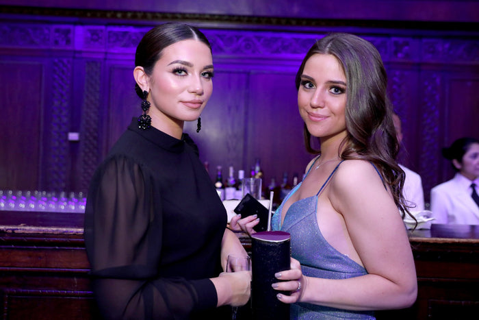 Two guests at the after party