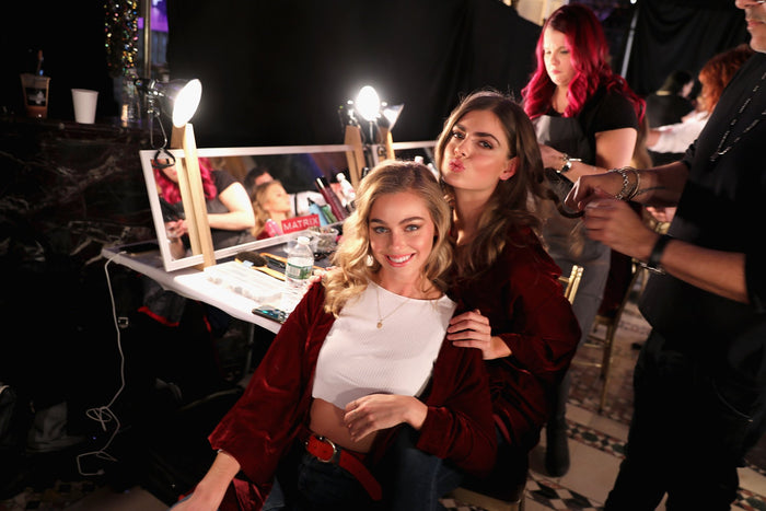 Hair and makeup at the mirror backstage