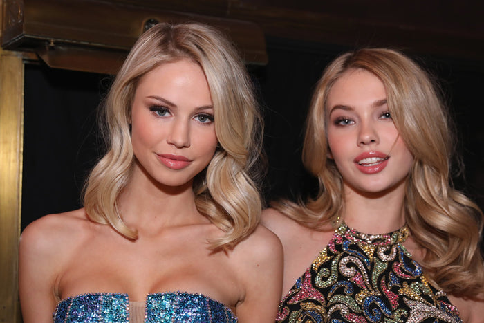 Models Scarlett Leithold and Hanna Edwinson in the blue plaid sequin mini and the multicolour beaded mini backstage