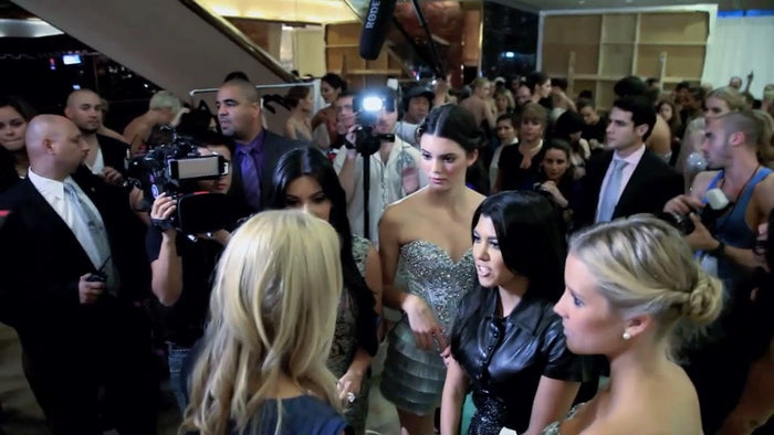 Kendall Jenner with Kim Kardashian and Kourtney Kardashian at the Sherri Hill Spring 2012 show