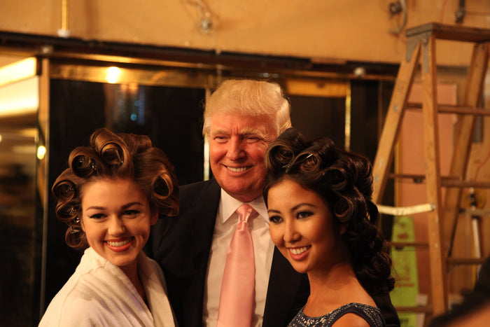 Sadie Robertson poses with Donald Trump backstage